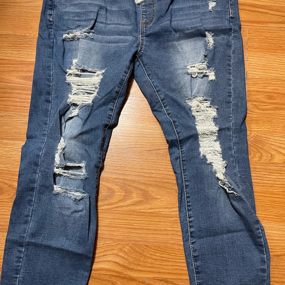 Distressed Blue Jeans
